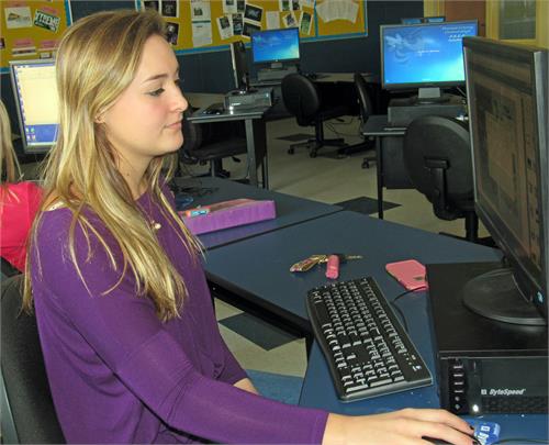 Students work to create yearbook