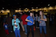 Student council and National Honor Society students enjoy dancing with dance attendees.