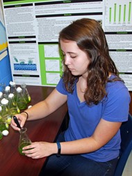 TCCHS student C’lee Kornegay has been chosen to attend this summer’s Governor’s Honors Program in the field of science. Here, Kornegay monitors the growth of algae for her experiment on how diversity affects algal response to ocean acidification.