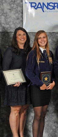   TCCHS FFA Chapter Advisor Robbie Harrison with Georgia FFA Degree and Specialty Crop Production Proficiency winner Sarah Moore.