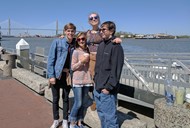 TCCHS students Hunter Green, Angela Cipriani, Jensey Humphries and Kenneth Starling in front of the Savannah River during a recent French trip to the city.