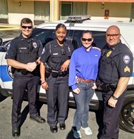 Thomasville Police Department’s (left to right) Officer Tucker, Officer Jones, and Officer Mullins pose for a photo with TCCHS senior Hailie Hutchison, who shadowed Jones for the day.