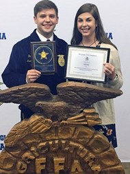 TCCHS National FFA Organization chapter member Brentley Odom and adviser Nikki Smith celebrate his placements during CDE competition at the 90th annual Georgia FFA Convention.