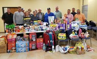 Members of TCCHS Athletic Boosters pose with Hurricane Michael donations.