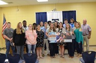 TCCHS agriculture students celebrate with teacher and grant writer Nikki Smith.