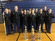 TCCHS JROTC Drill team cadets celebrate their wins at the Area 2 Drill Region Championship.