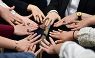  TC Masquers One Act team members show off their state championship rings.