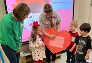 Pre-Kindergarteners Share the Love with Principal 